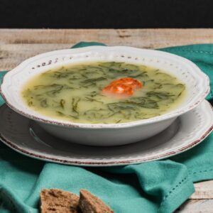 green broth with cornmeal and calabresa
